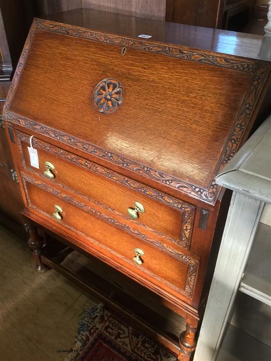 Reproduction carved oak bureau